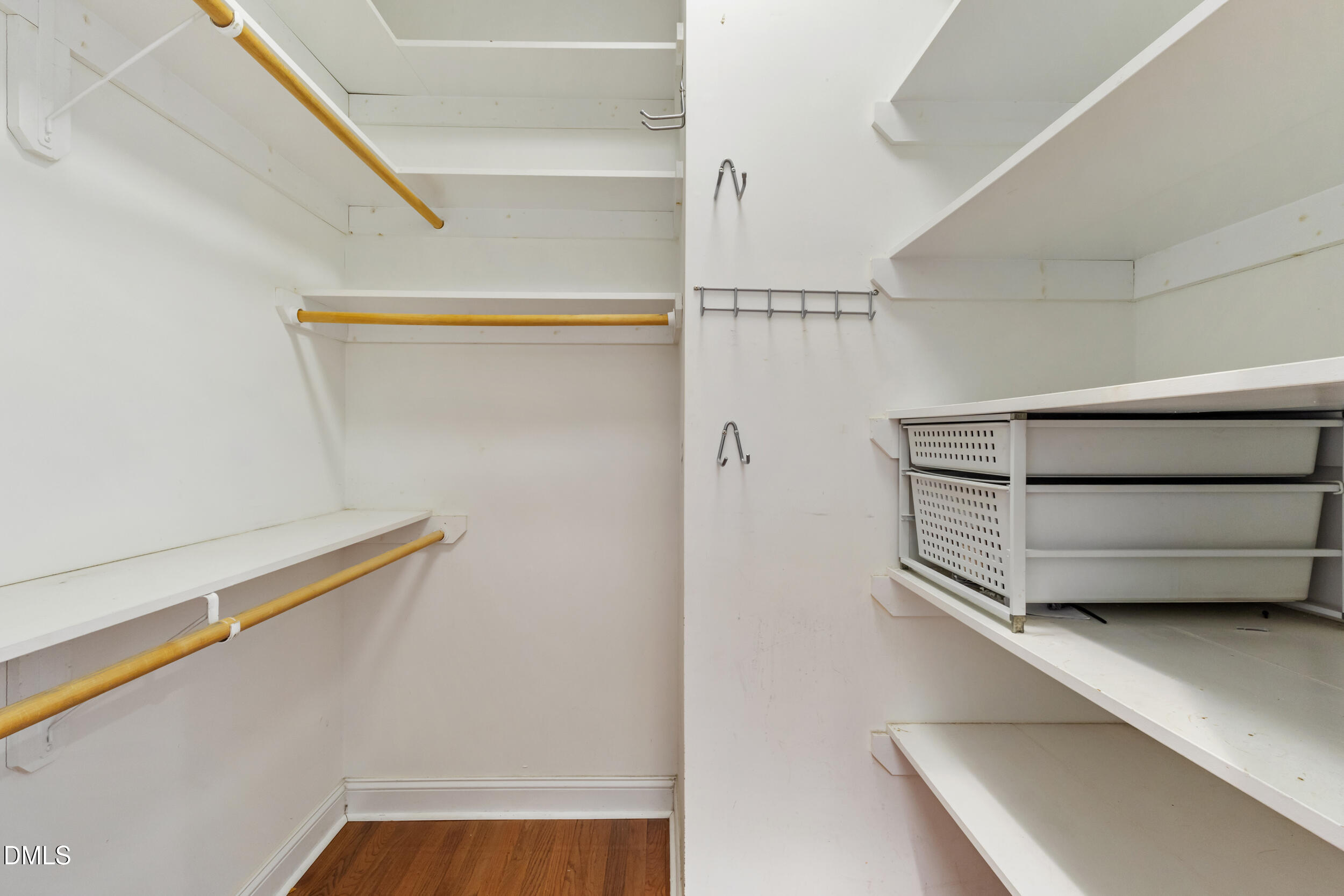 6816 Cool Pond Road Raleigh, NC 27613 - Photo 21 of 65 a view of an empty walk in closet
