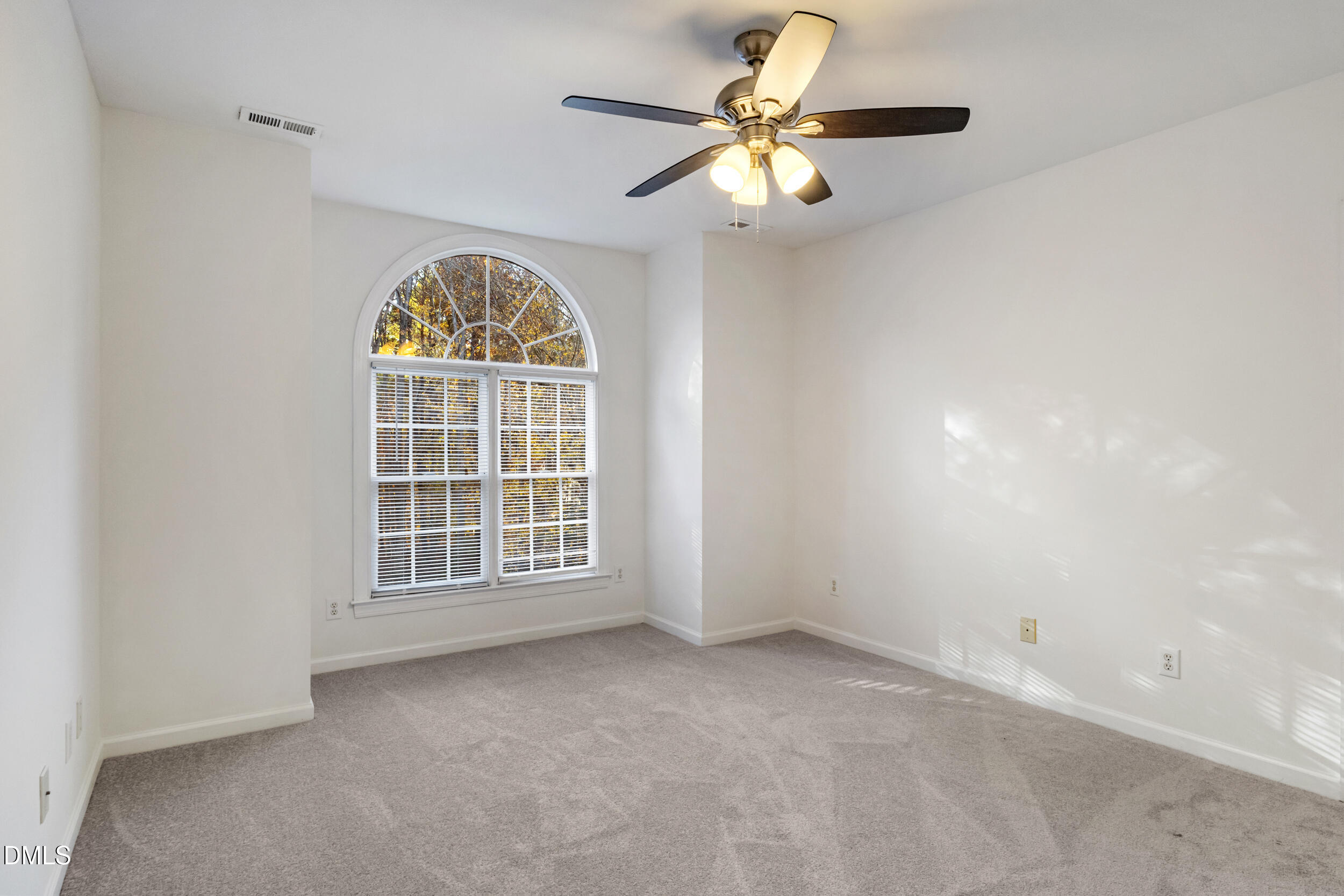 6816 Cool Pond Road Raleigh, NC 27613 - Photo 32 of 65 an empty room with a window