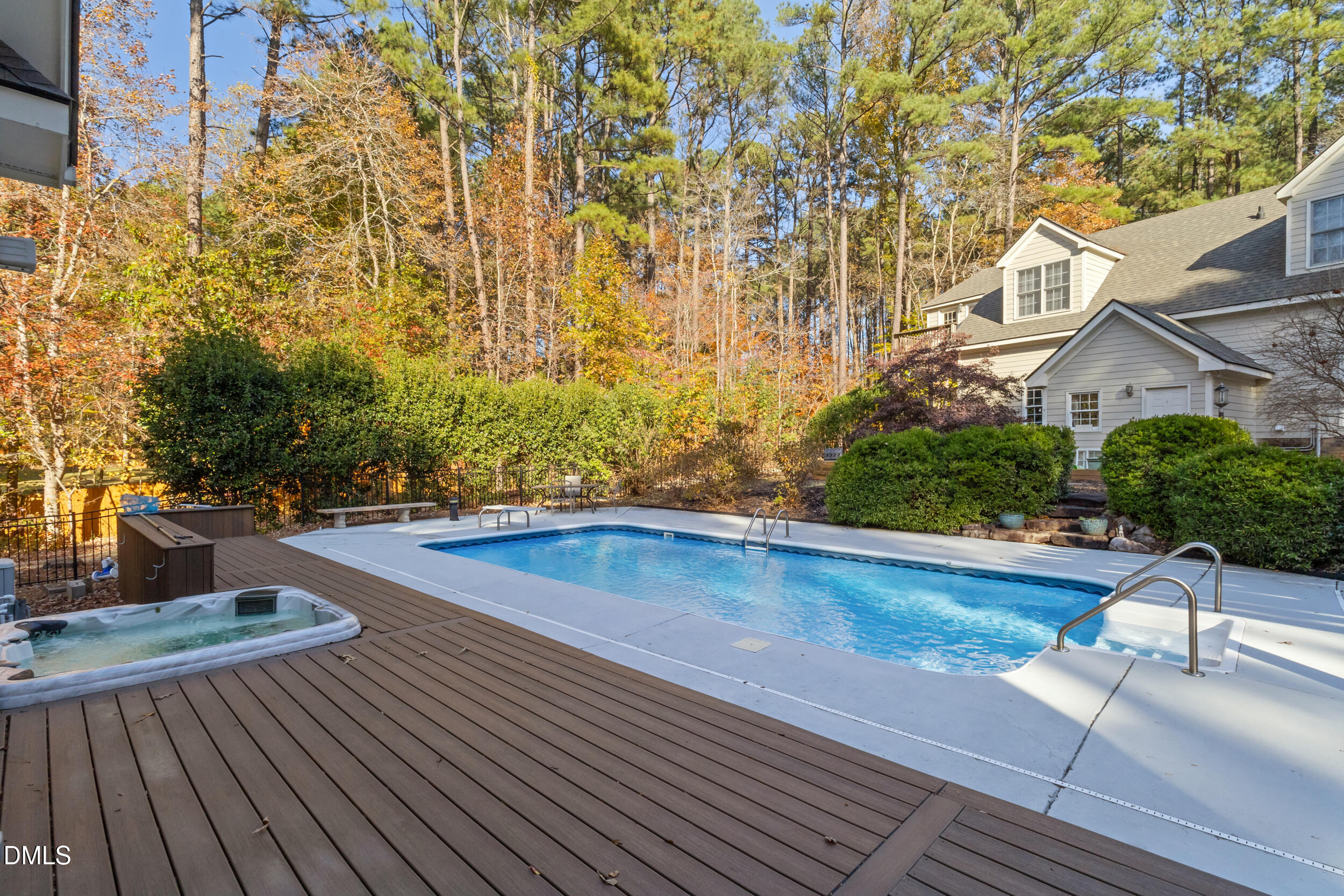 6816 Cool Pond Road Raleigh, NC 27613 - Photo 49 of 65 a view of outdoor space swimming pool and lounge chair