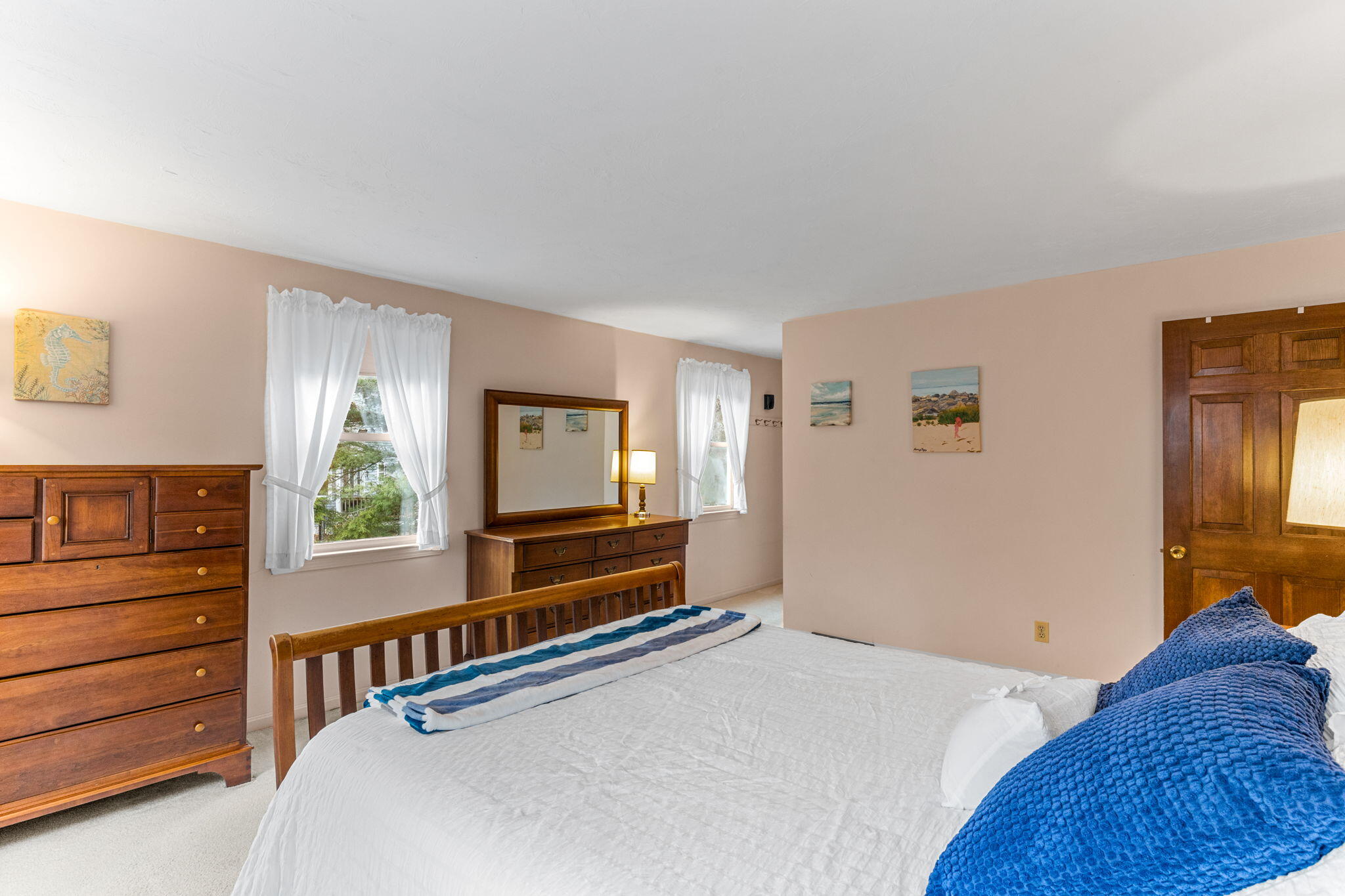 93 Valley Bars Road Buzzards Bay, MA 02532 - Photo 16 of 34 a bedroom with furniture and a flat screen tv