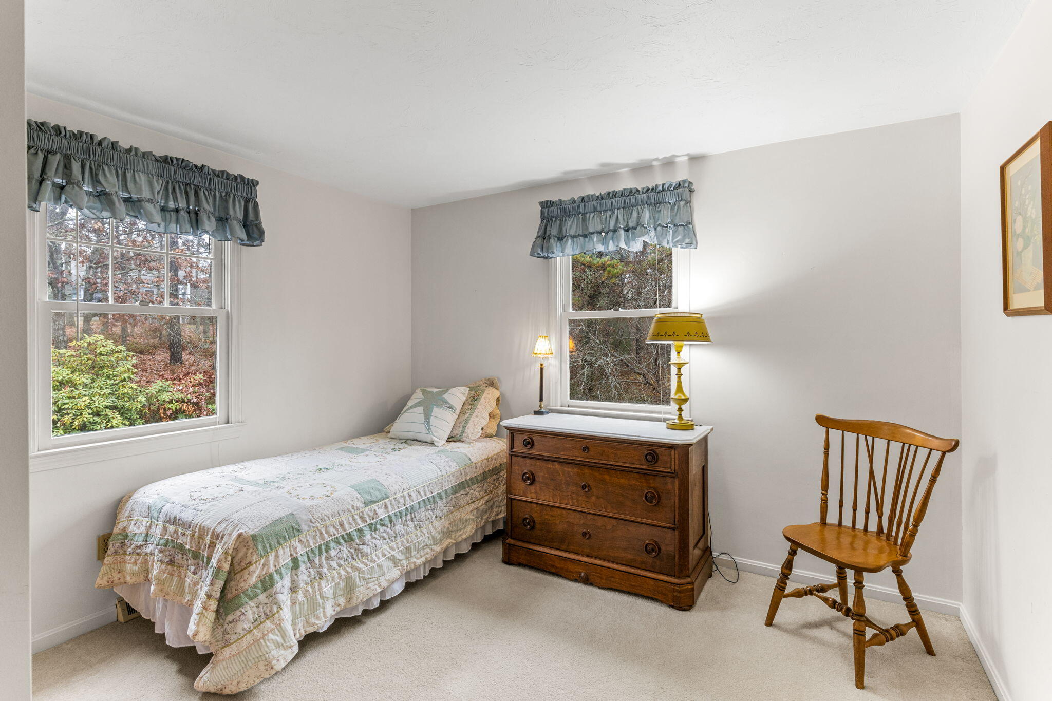 93 Valley Bars Road Buzzards Bay, MA 02532 - Photo 20 of 34 a bedroom with a bed chair and a window