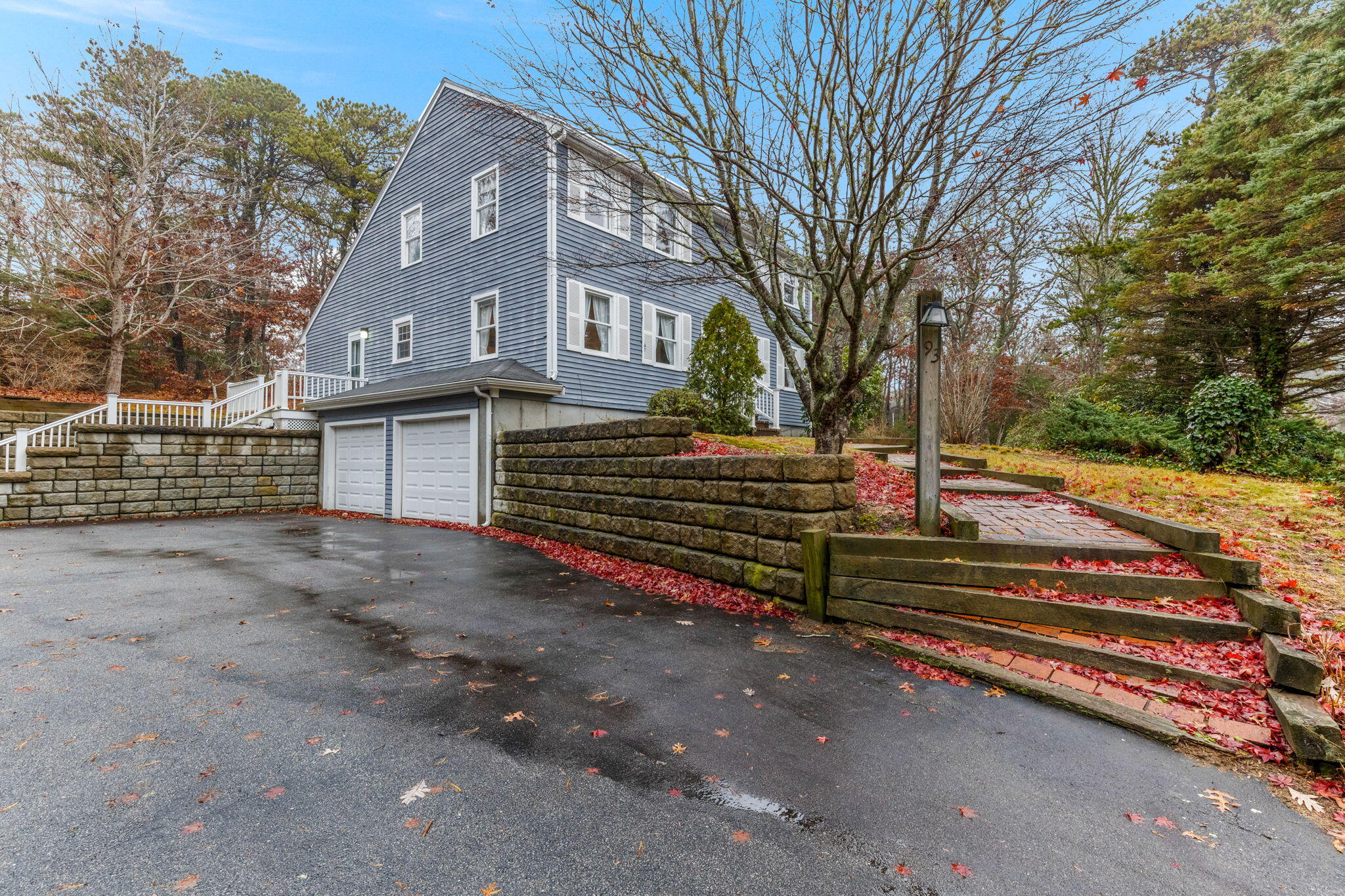 93 Valley Bars Road Buzzards Bay, MA 02532 - Photo 2 of 34 a front view of a house with a yard