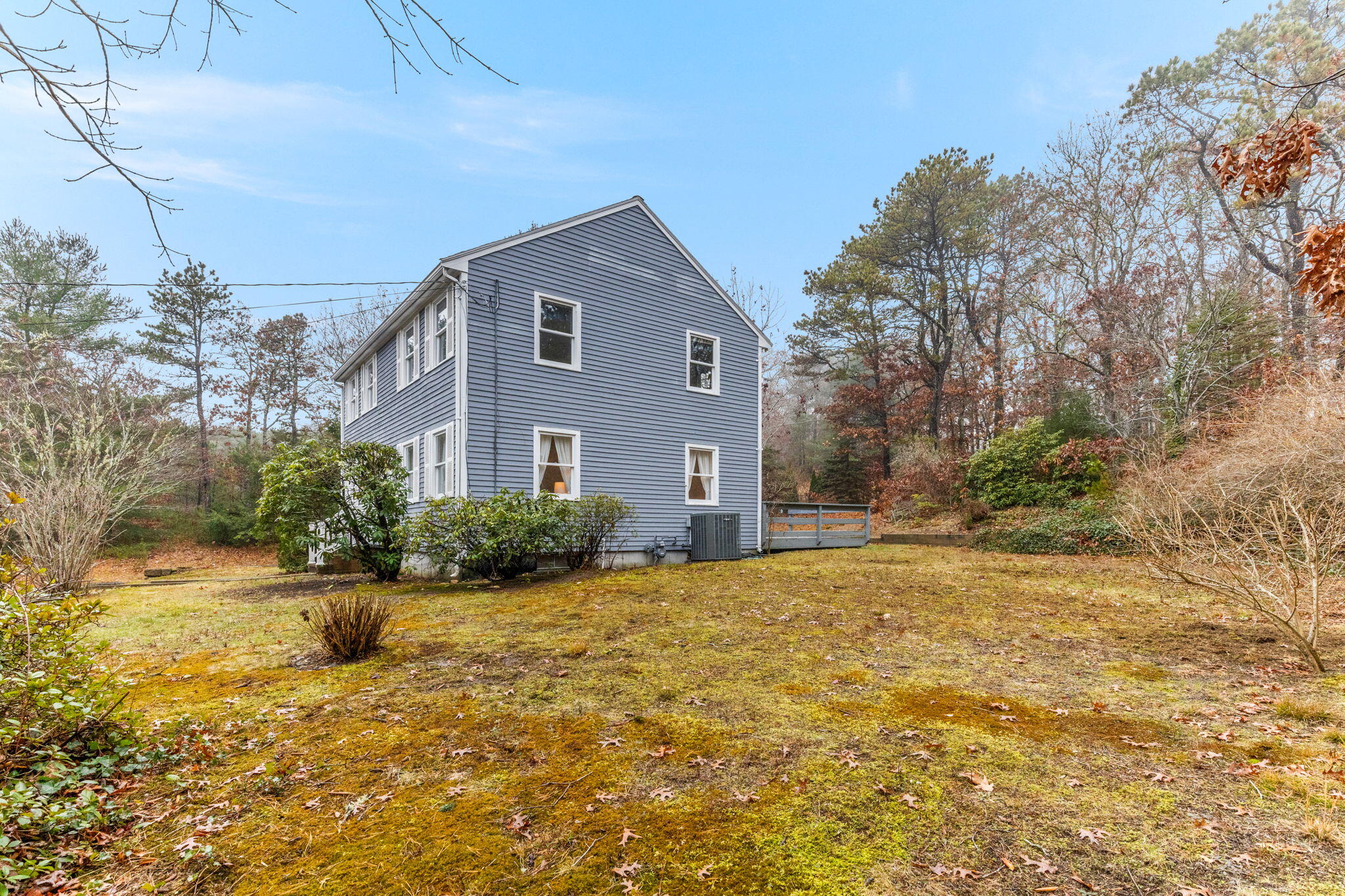 93 Valley Bars Road Buzzards Bay, MA 02532 - Photo 22 of 34 a front view of a house with a yard