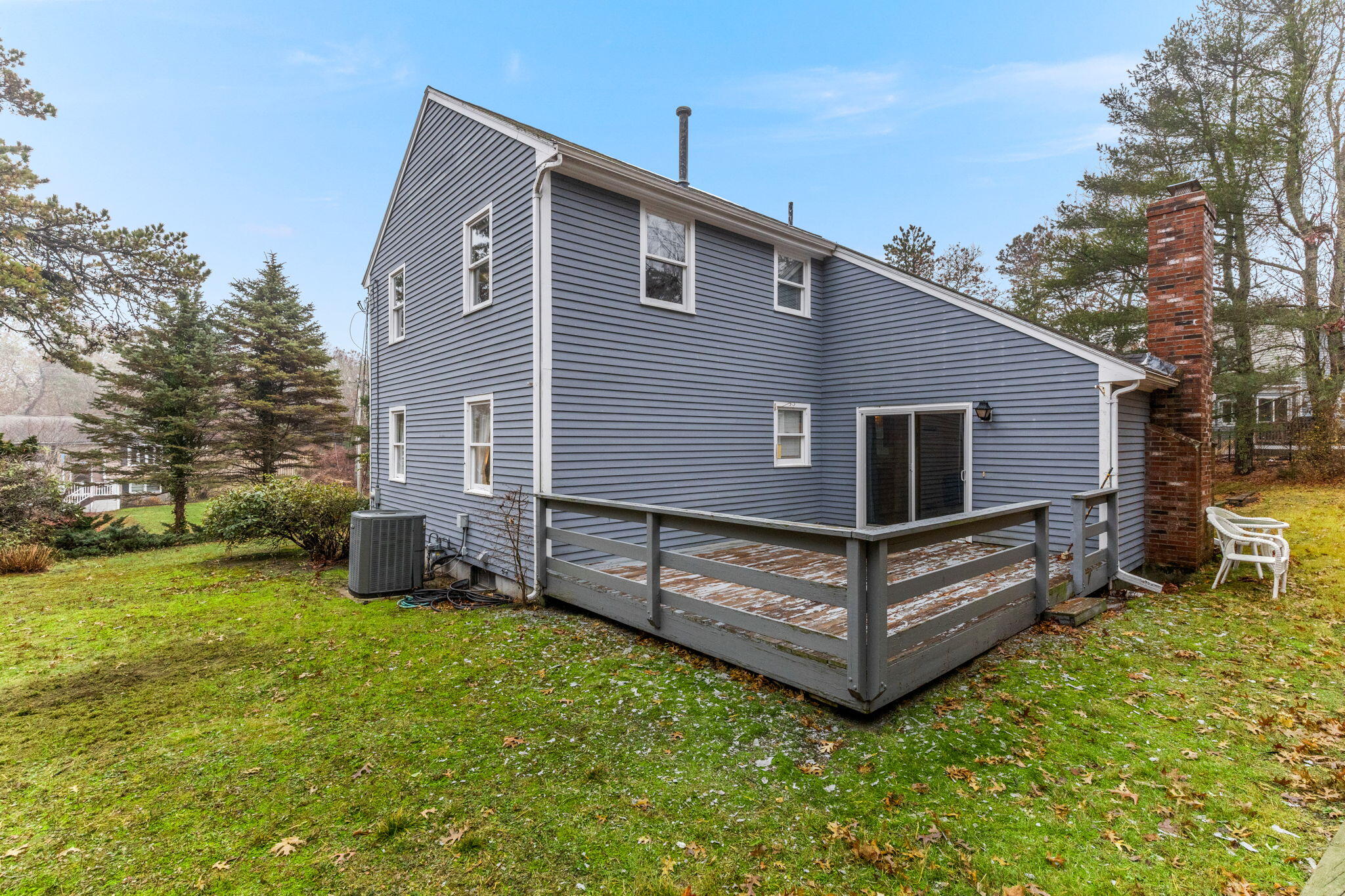 93 Valley Bars Road Buzzards Bay, MA 02532 - Photo 23 of 34 a view of a house with a yard and sitting area