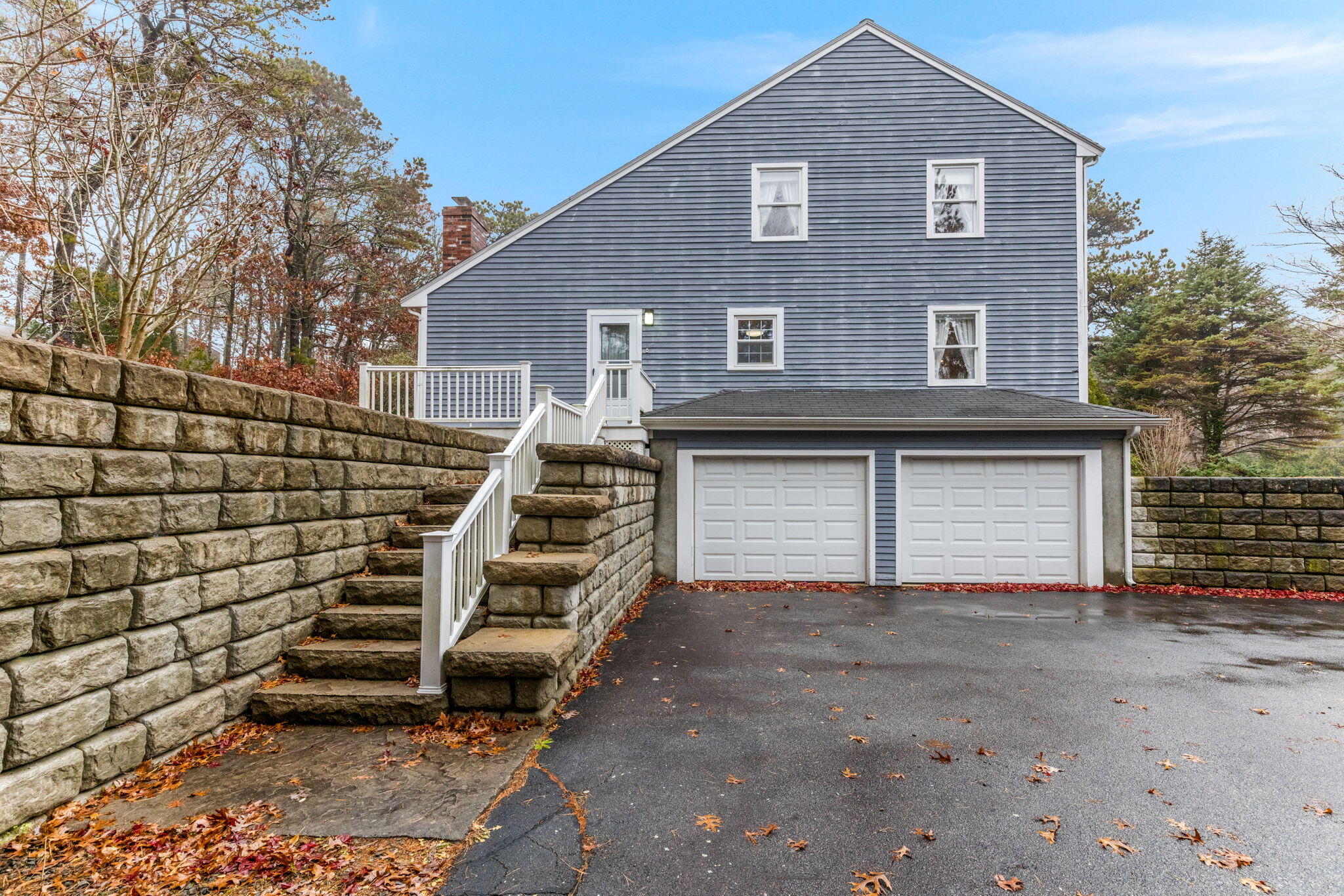 93 Valley Bars Road Buzzards Bay, MA 02532 - Photo 26 of 34 a front view of a house with a garage
