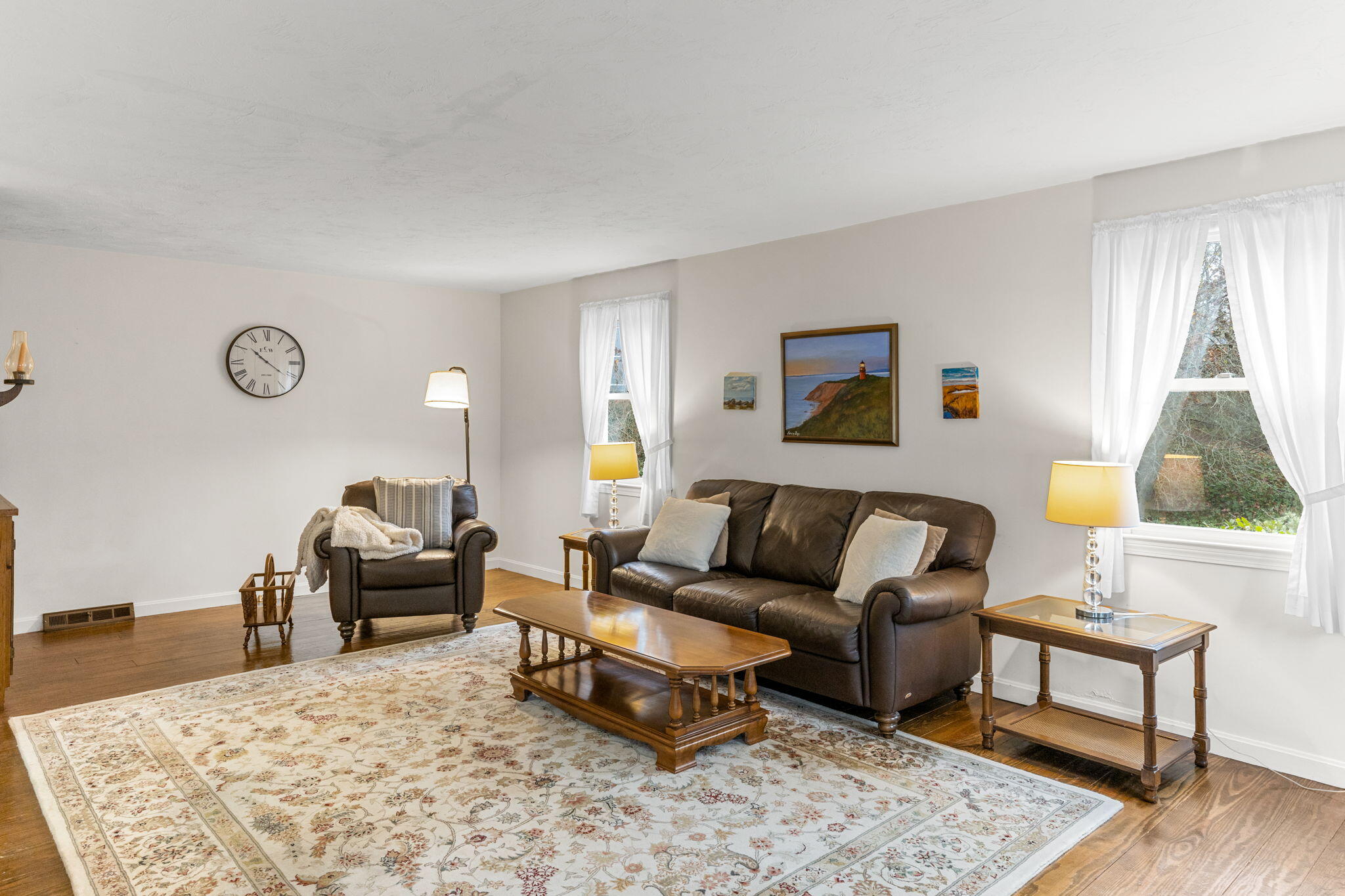 93 Valley Bars Road Buzzards Bay, MA 02532 - Photo 6 of 34 a living room with furniture and a rug