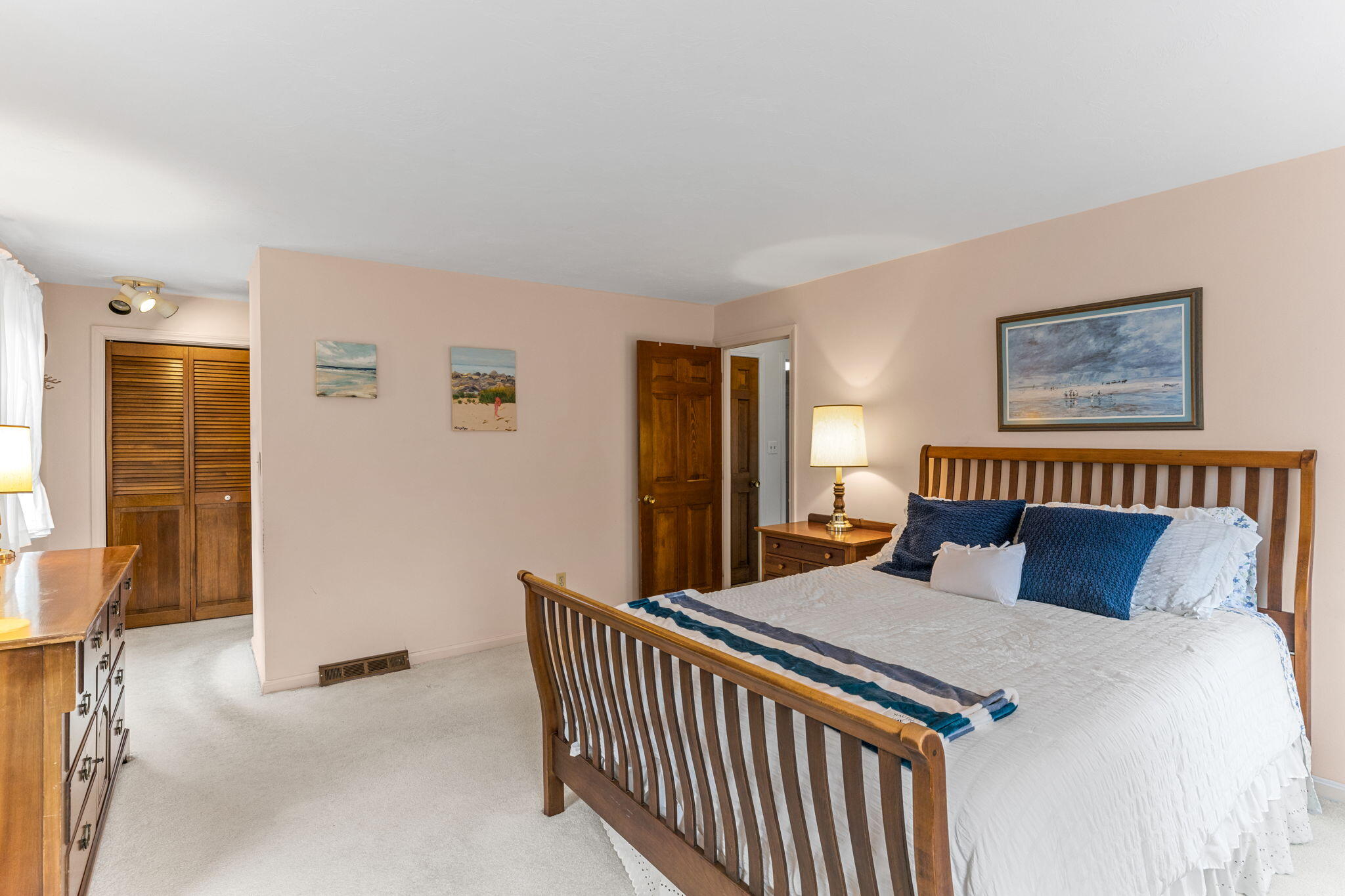 93 Valley Bars Road Buzzards Bay, MA 02532 - Photo 7 of 34 a bedroom with a large bed and a window