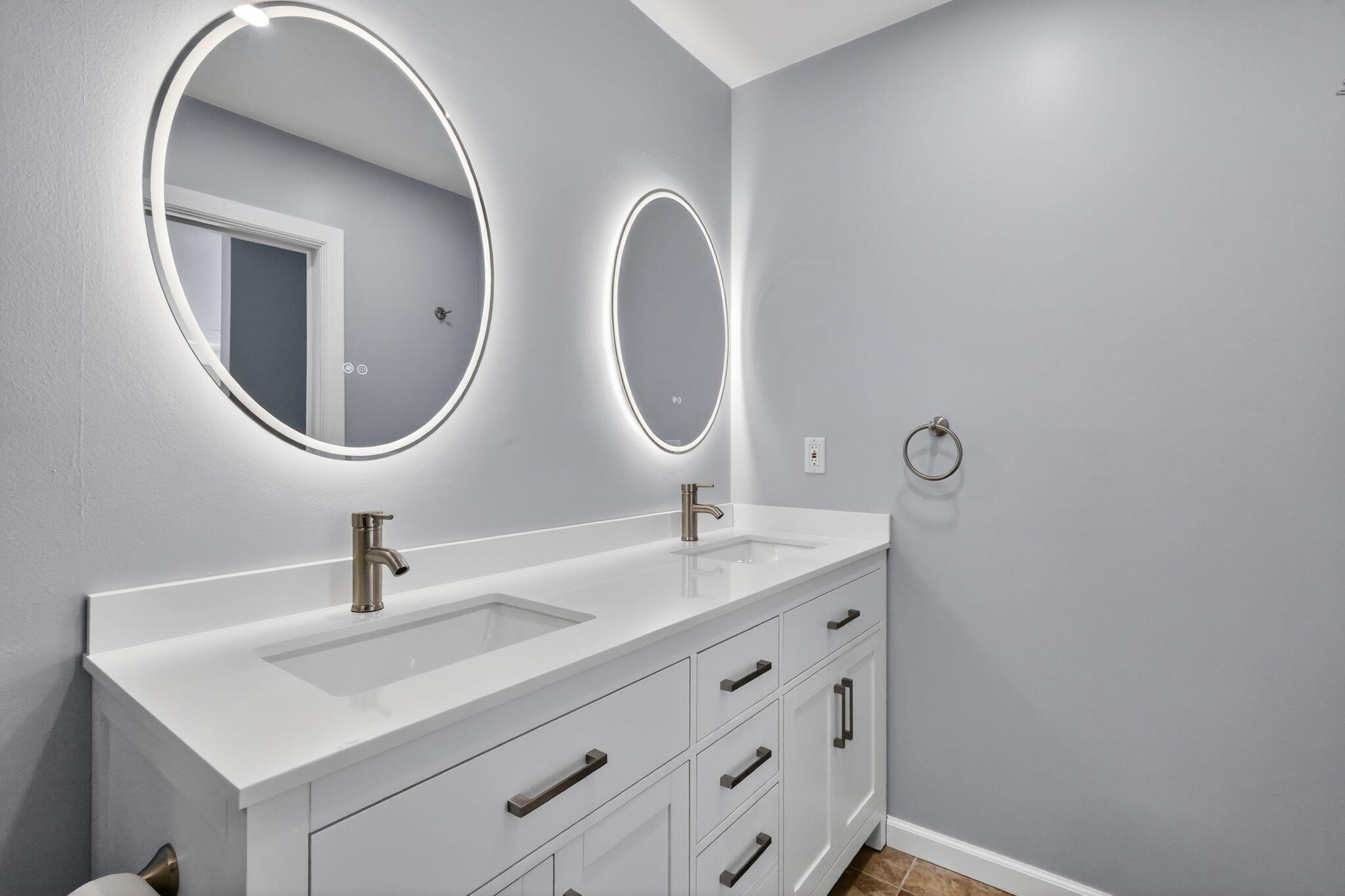 14280 Nesting Way, Unit B Delray Beach, FL 33484 - Photo 25 of 43 a bathroom with a sink and a mirror