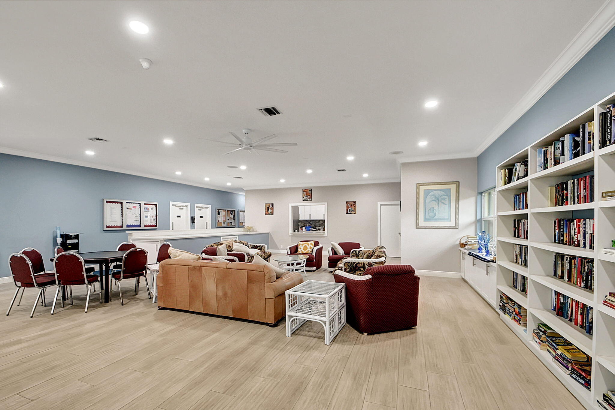 14280 Nesting Way, Unit B Delray Beach, FL 33484 - Photo 37 of 43 a living room with furniture and a book shelf