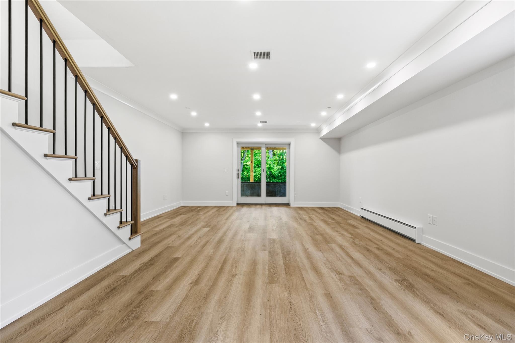 86 B Maple Street Rye, NY 10580 - Photo 23 of 33 a view of an empty room and wooden floor