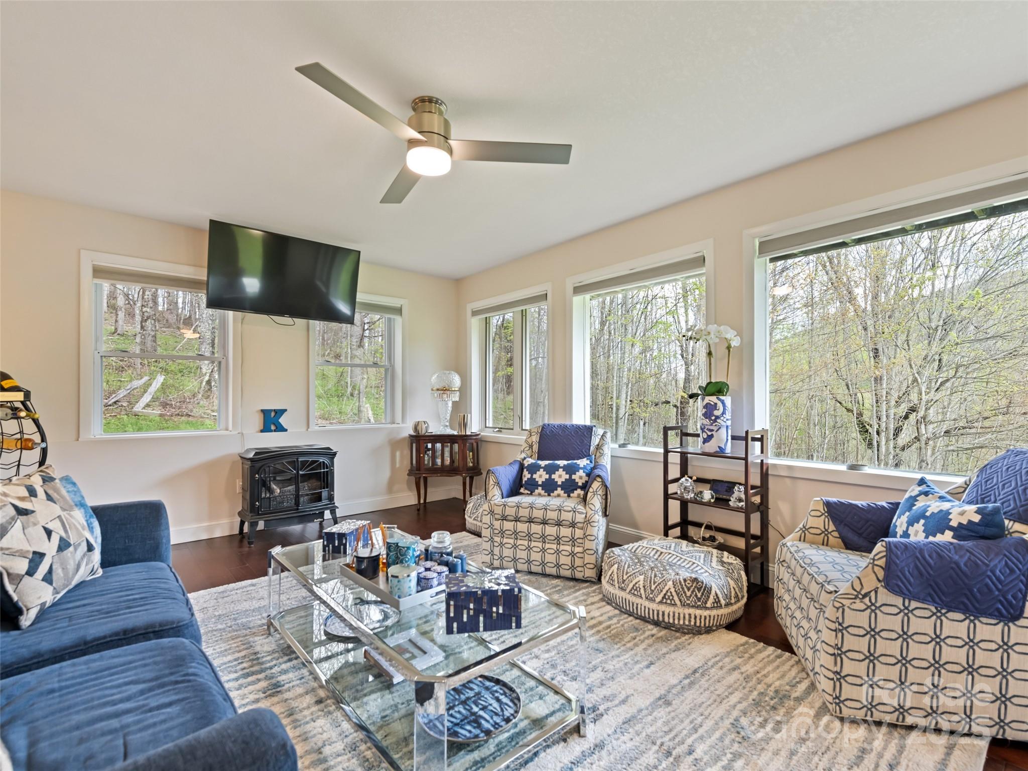 6780 Max Patch Road Clyde, NC 28721 - Photo 8 of 32 a living room with furniture and a large window