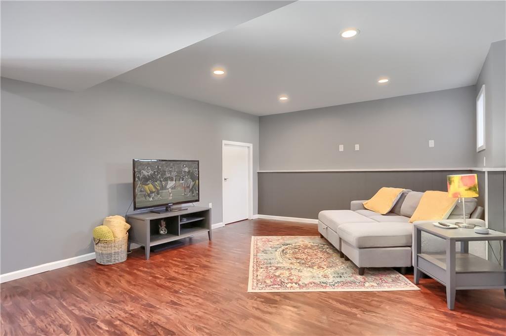 313 Sandworks Road Hunker, PA 15639 - Photo 36 of 48 a living room with furniture and wooden floor