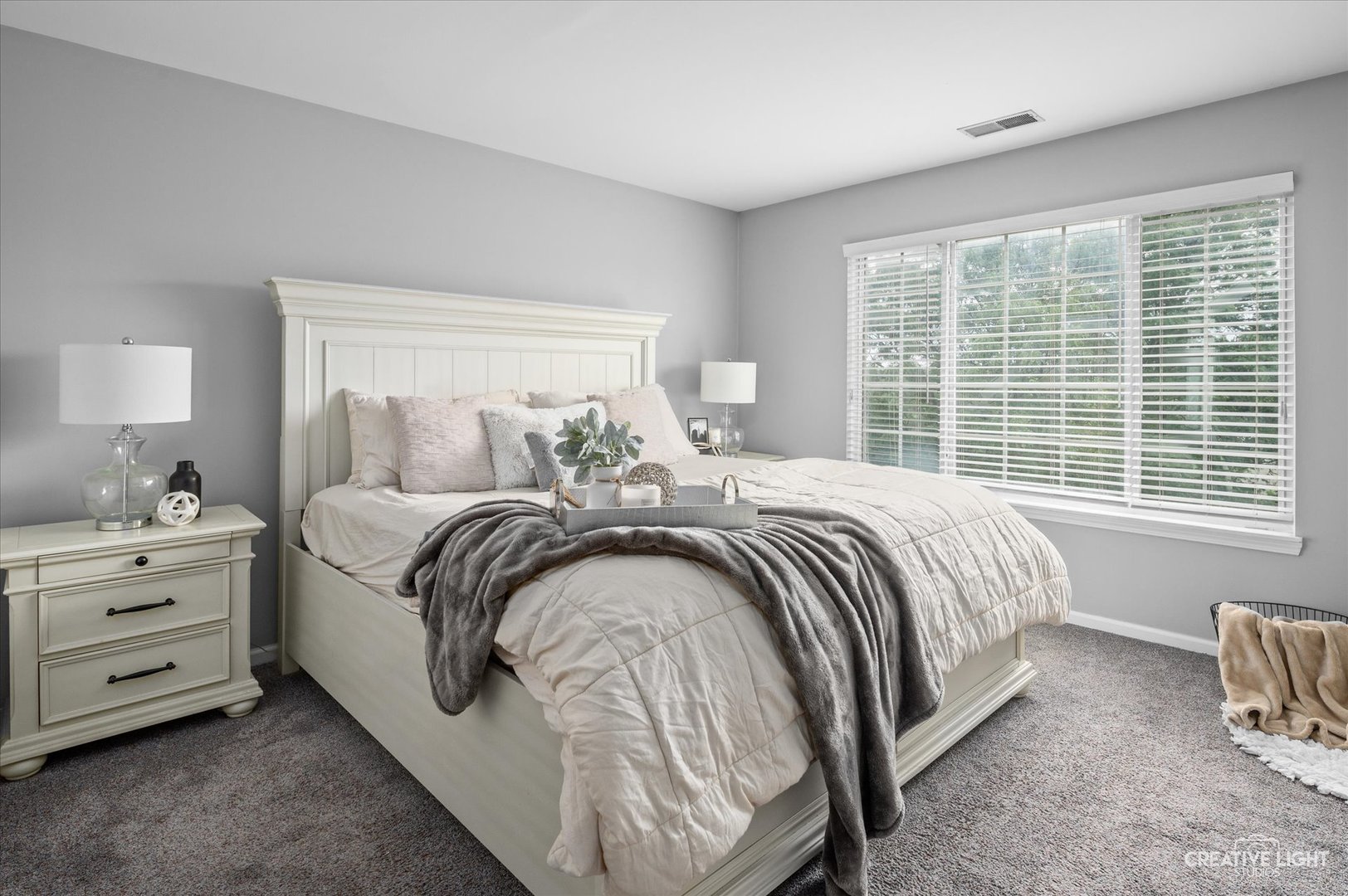3405 Ravinia Circle, Unit 3405 Aurora, IL 60504 - Photo 11 of 17 a bedroom with a bed and a window