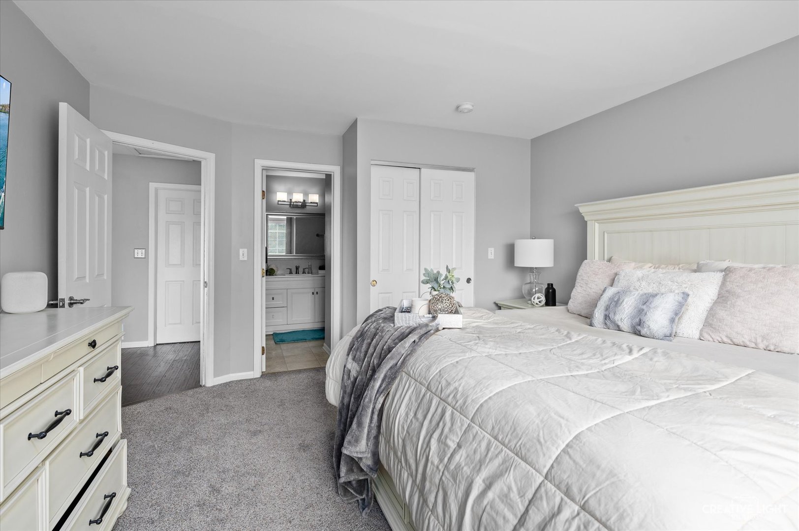 3405 Ravinia Circle, Unit 3405 Aurora, IL 60504 - Photo 12 of 17 a bedroom with a bed and a walk in closet