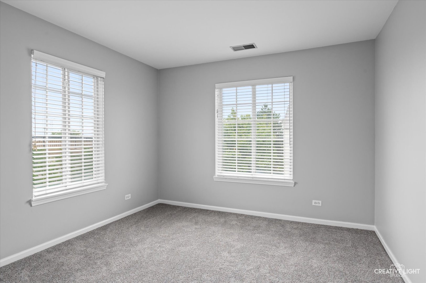 3405 Ravinia Circle, Unit 3405 Aurora, IL 60504 - Photo 14 of 17 a view of an empty room with a window