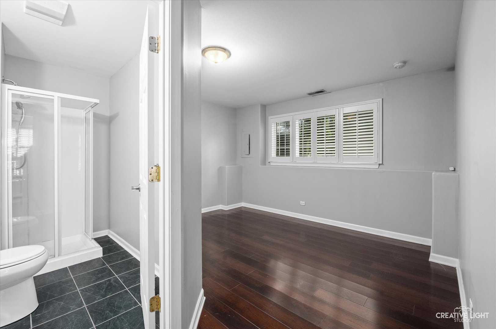 3405 Ravinia Circle, Unit 3405 Aurora, IL 60504 - Photo 15 of 17 a bathroom with a toilet and a shower