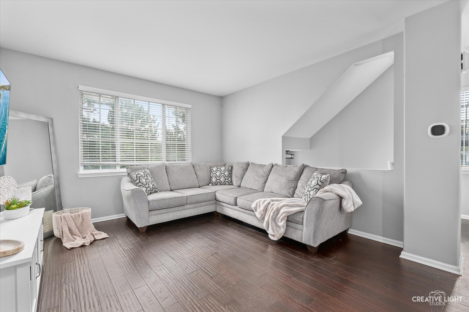 3405 Ravinia Circle, Unit 3405 Aurora, IL 60504 - Photo 3 of 17 a living room with furniture and a large window