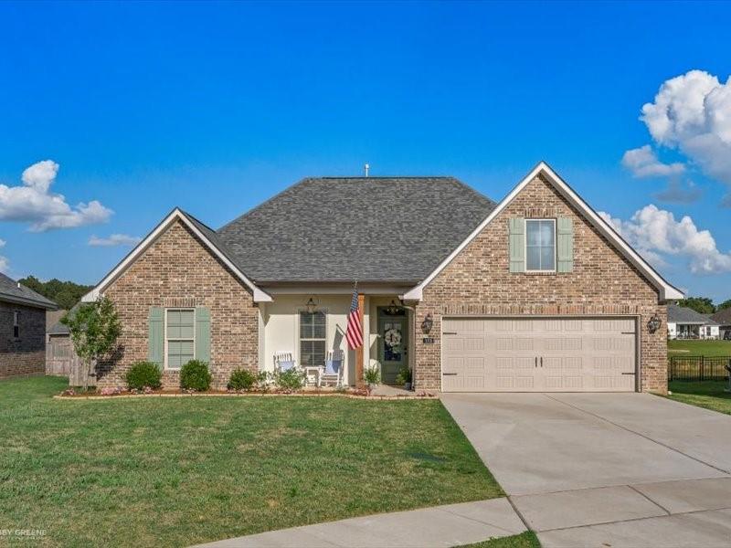 133 Brimestone Loop Benton, LA 71006 - Photo 31 of 32 a front view of a house with a yard