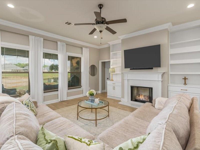 133 Brimestone Loop Benton, LA 71006 - Photo 9 of 31 Living room. Love the flooring and builtins.