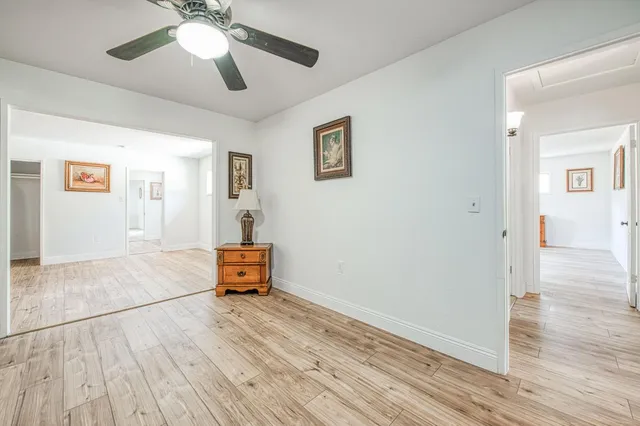 a view of a livingroom with wooden floor