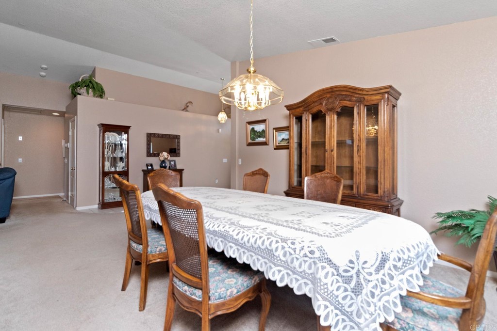575 Rancho Trail Ramona, CA 92065 - Photo 18 of 47 a dining room with furniture and window