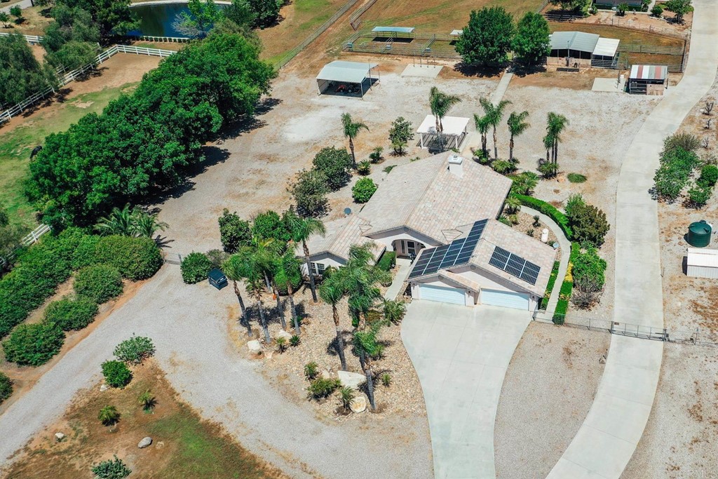 575 Rancho Trail Ramona, CA 92065 - Photo 2 of 47 an aerial view of a house with a yard and a garden