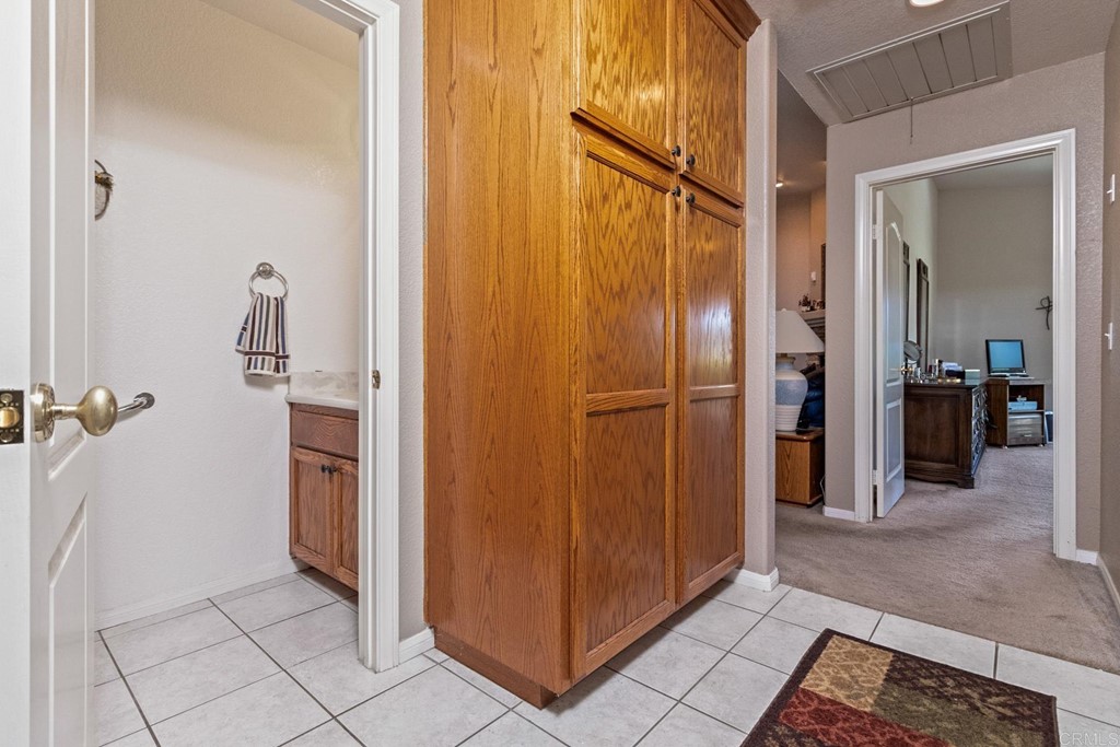 575 Rancho Trail Ramona, CA 92065 - Photo 27 of 47 a view of bathroom with a shower and closet