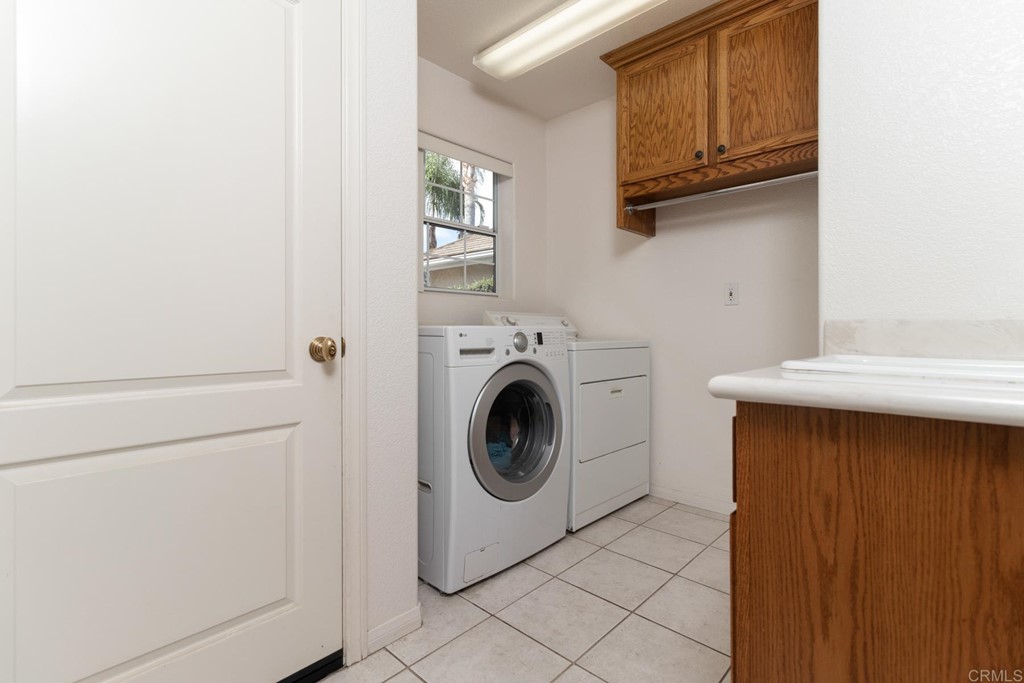575 Rancho Trail Ramona, CA 92065 - Photo 35 of 47 a utility room with dryer and washer