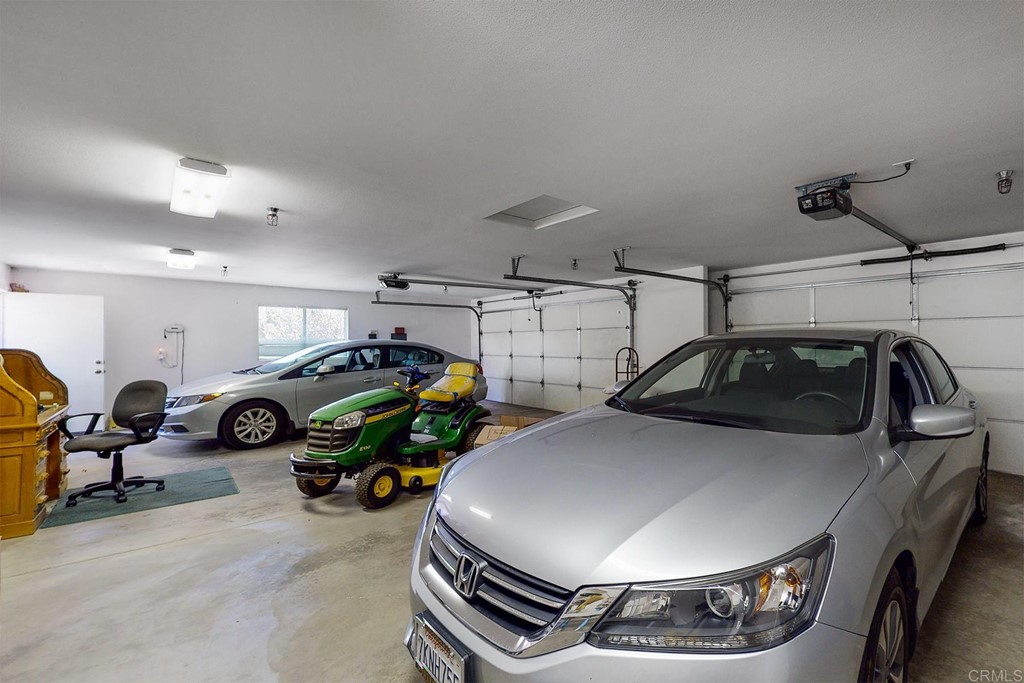 575 Rancho Trail Ramona, CA 92065 - Photo 36 of 47 a view of parking garage with cars and parked
