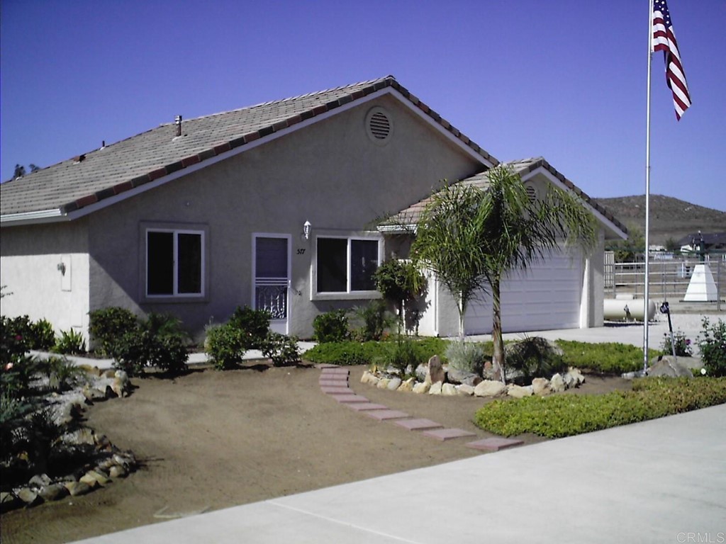 575 Rancho Trail Ramona, CA 92065 - Photo 44 of 47 a front view of a house with a yard