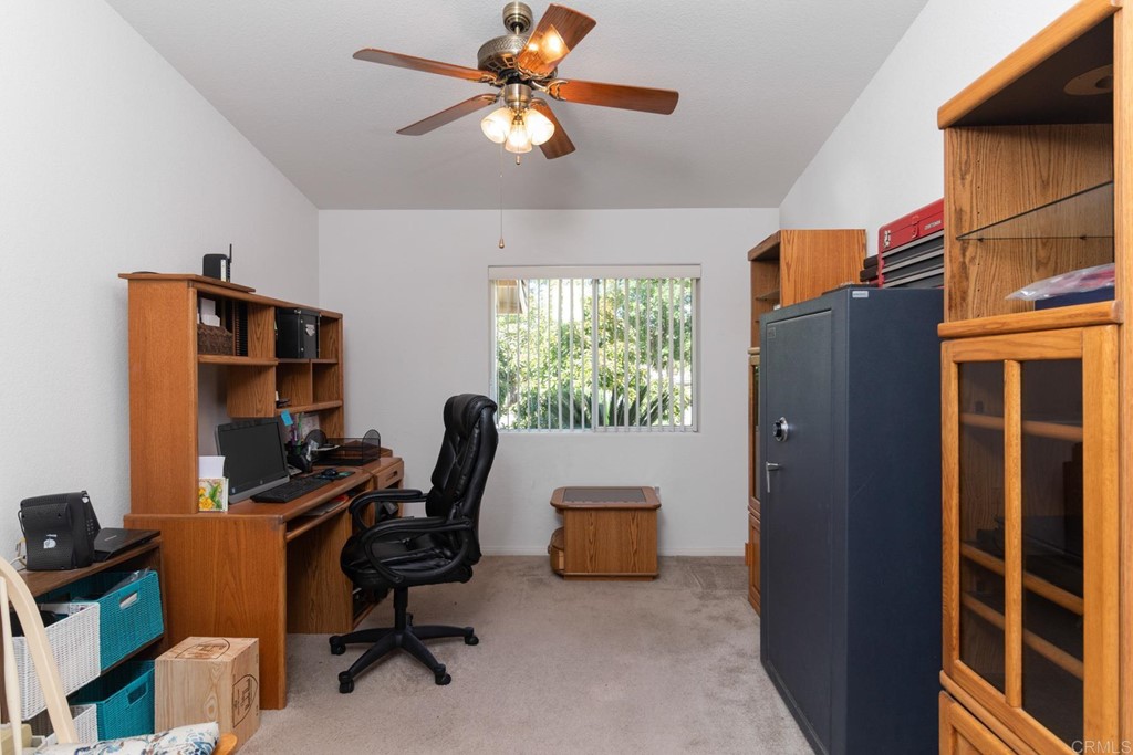 575 Rancho Trail Ramona, CA 92065 - Photo 7 of 47 a view of a workspace with furniture and a window