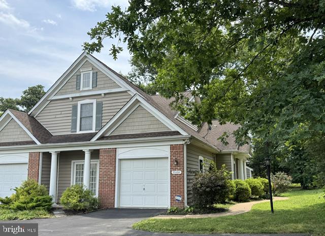 35104 Somerset Ridge Road Locust Grove, VA 22508 - Photo 2 of 2 Charming home with lush greenery.