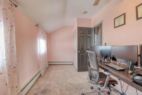 a workspace with furniture and window