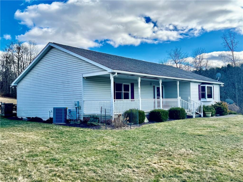 114 Church Road Rural Valley, PA 16249 - Photo 5 of 50 a view of a house with a yard
