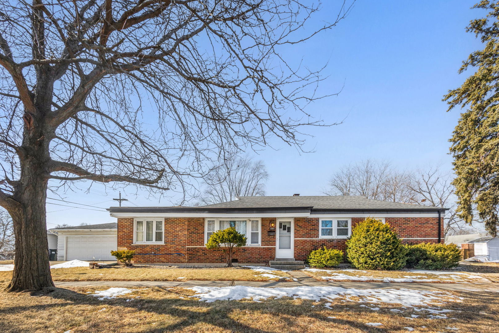 5901 108th Place Chicago Ridge, IL 60415 - Photo 1 of 15 a front view of house with yard and green space