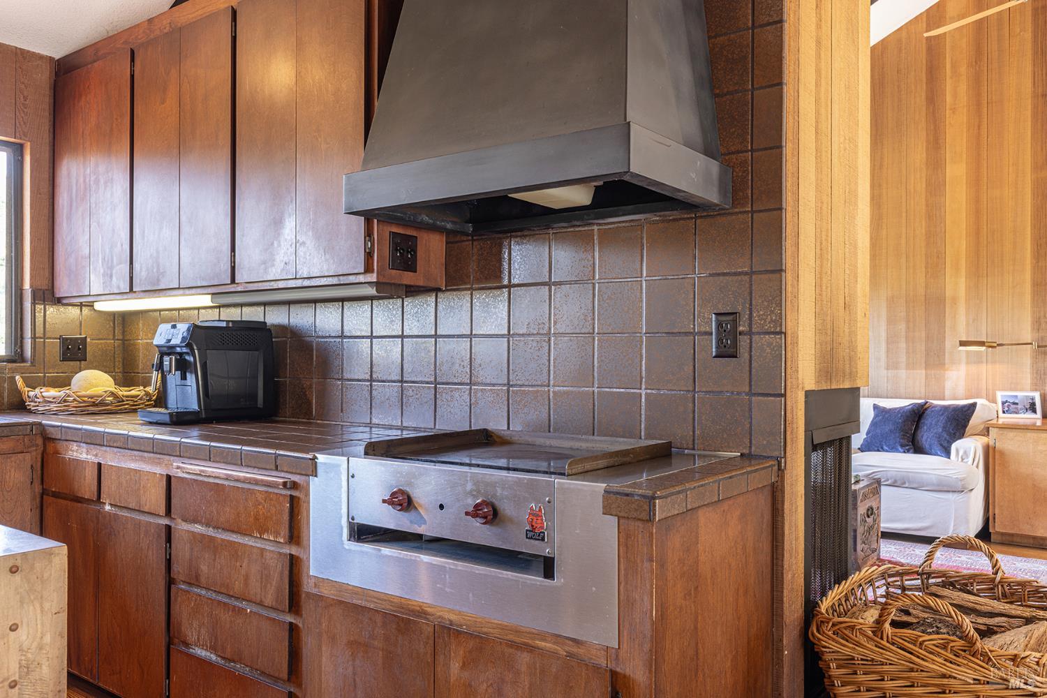 2231 First Avenue Napa, CA 94558 - Photo 16 of 64 a kitchen with stainless steel appliances granite countertop a stove a sink and a microwave