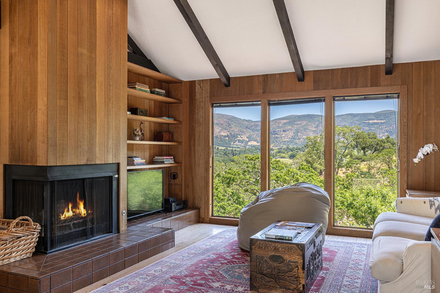 2231 First Avenue Napa, CA 94558 - Photo 20 of 64 a living room with furniture and a fireplace