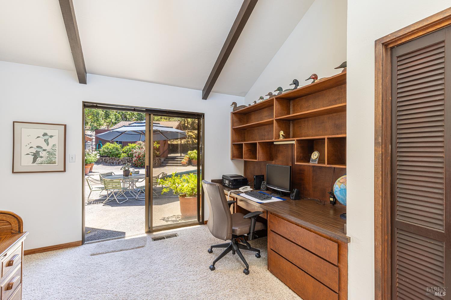 2231 First Avenue Napa, CA 94558 - Photo 27 of 64 a view of a workspace with furniture and a window