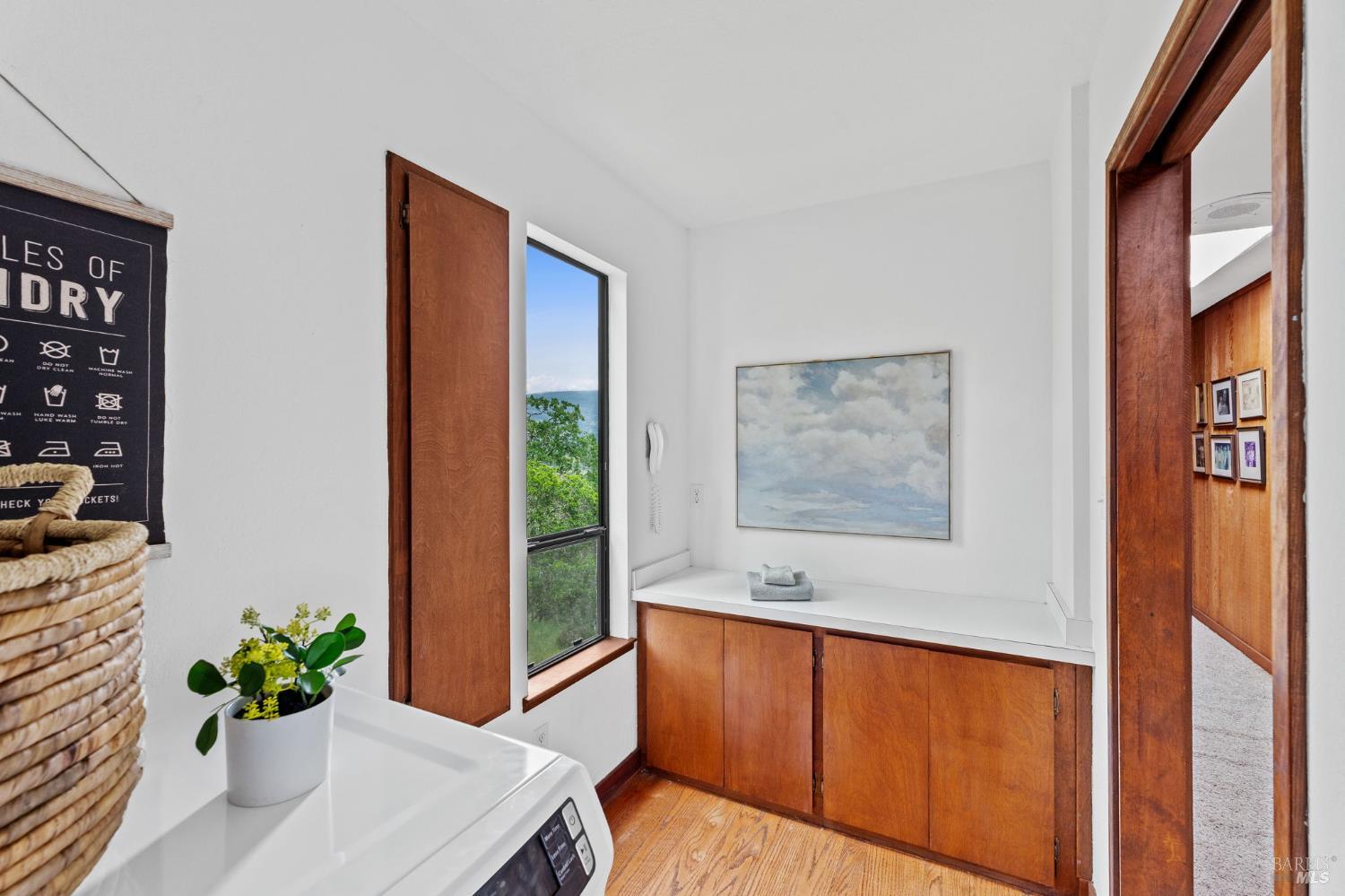 2231 First Avenue Napa, CA 94558 - Photo 29 of 64 a hallway with a potted plant on a dresser