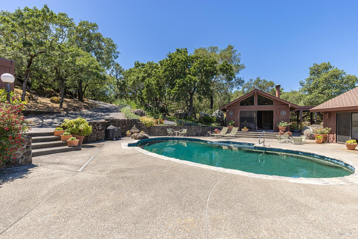 2231 First Avenue Napa, CA 94558 - Photo 3 of 64 a view of house with swimming pool and sitting area