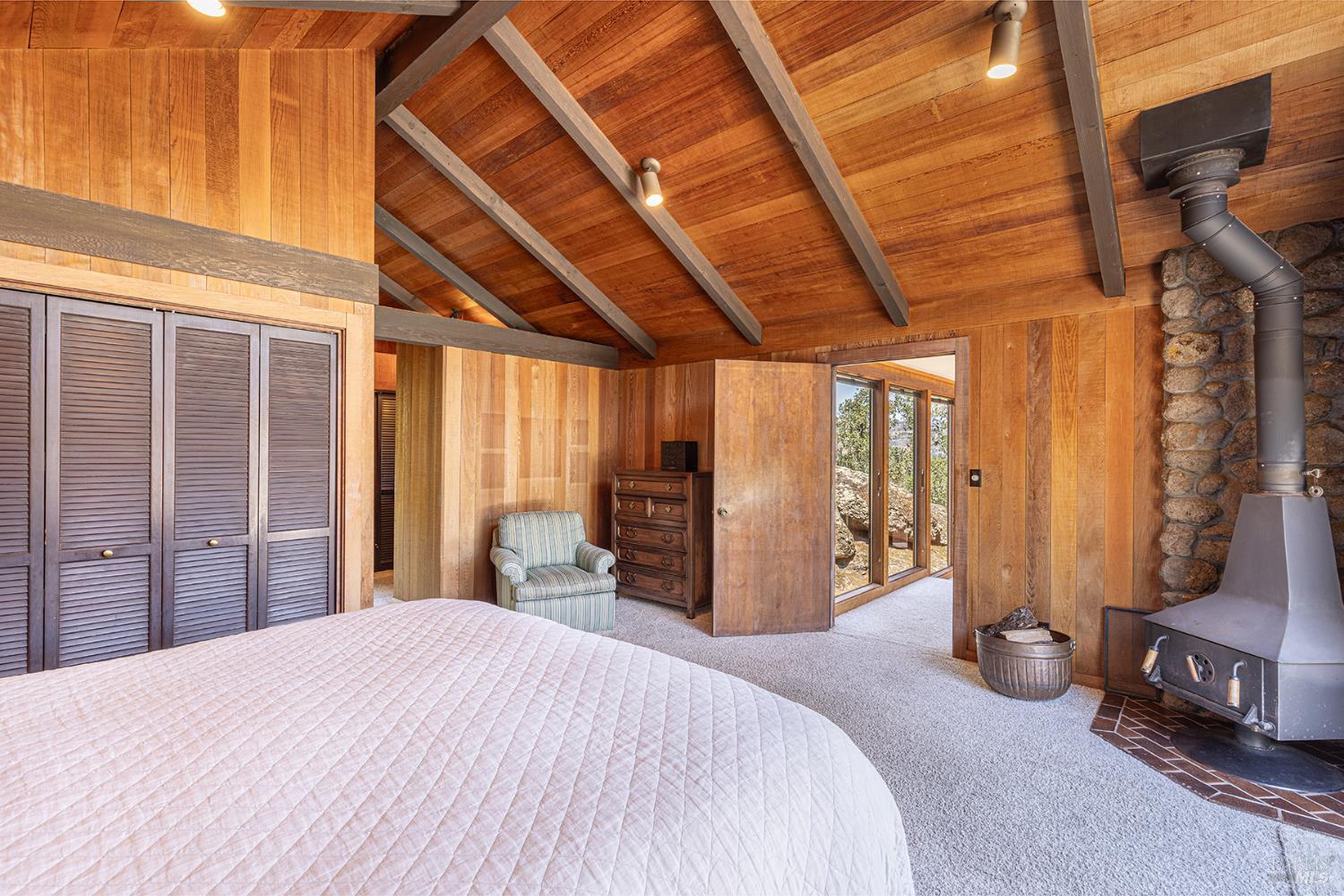 2231 First Avenue Napa, CA 94558 - Photo 38 of 64 a bedroom with a bed and wooden floor