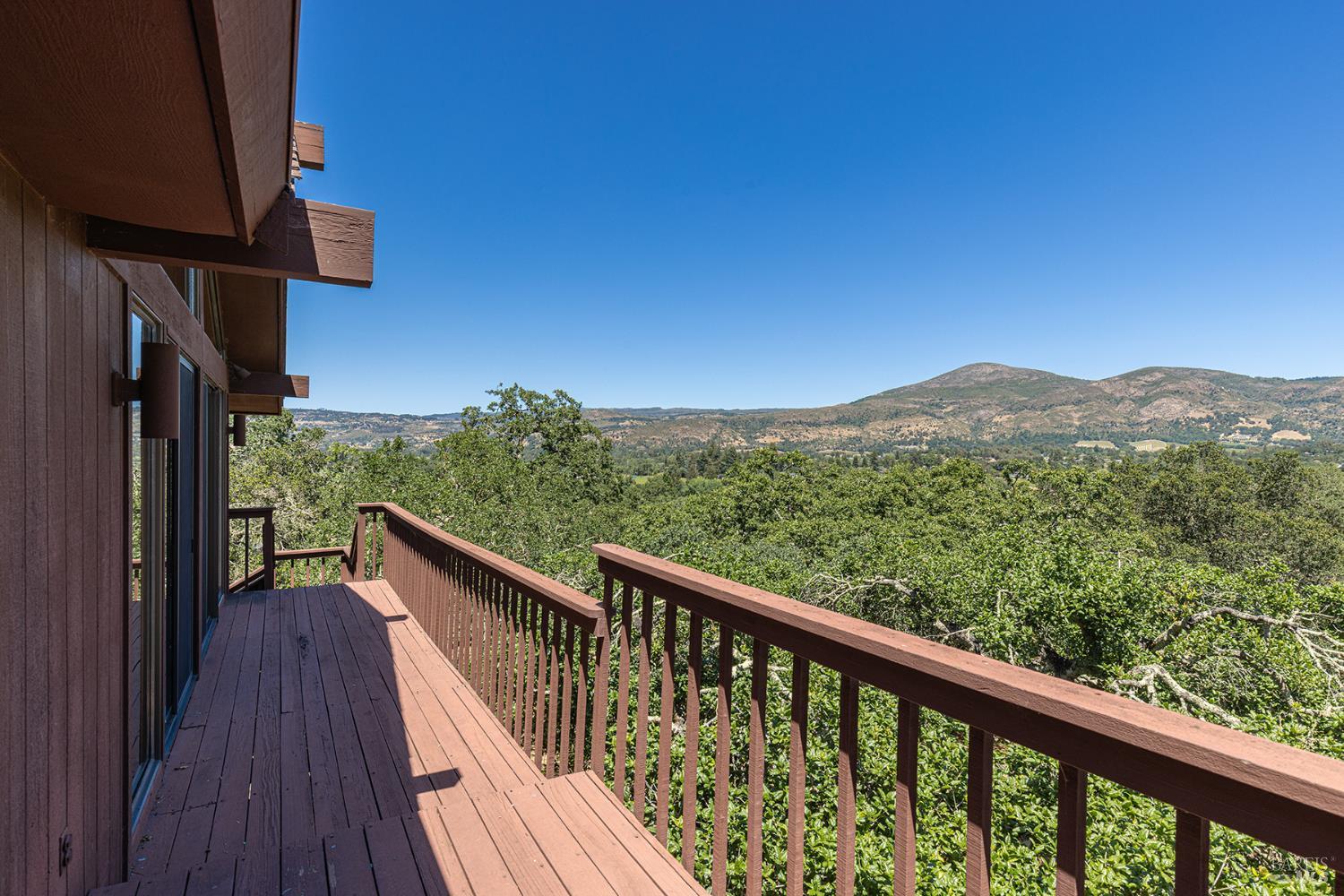 2231 First Avenue Napa, CA 94558 - Photo 47 of 64 a view of a balcony with wooden floor and fence