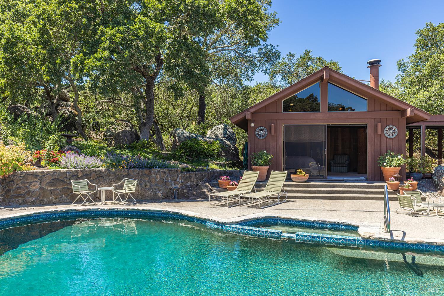2231 First Avenue Napa, CA 94558 - Photo 6 of 64 a view of house with swimming pool and a yard