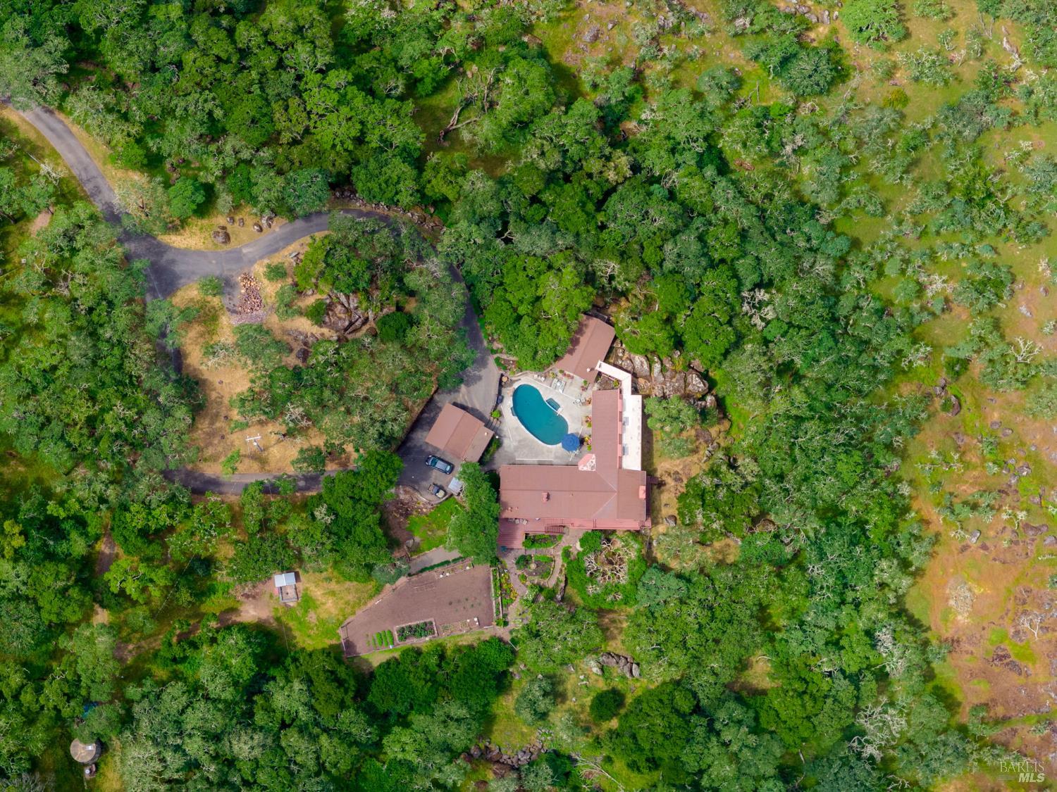 2231 First Avenue Napa, CA 94558 - Photo 63 of 64 an aerial view of a house with a yard and lake view