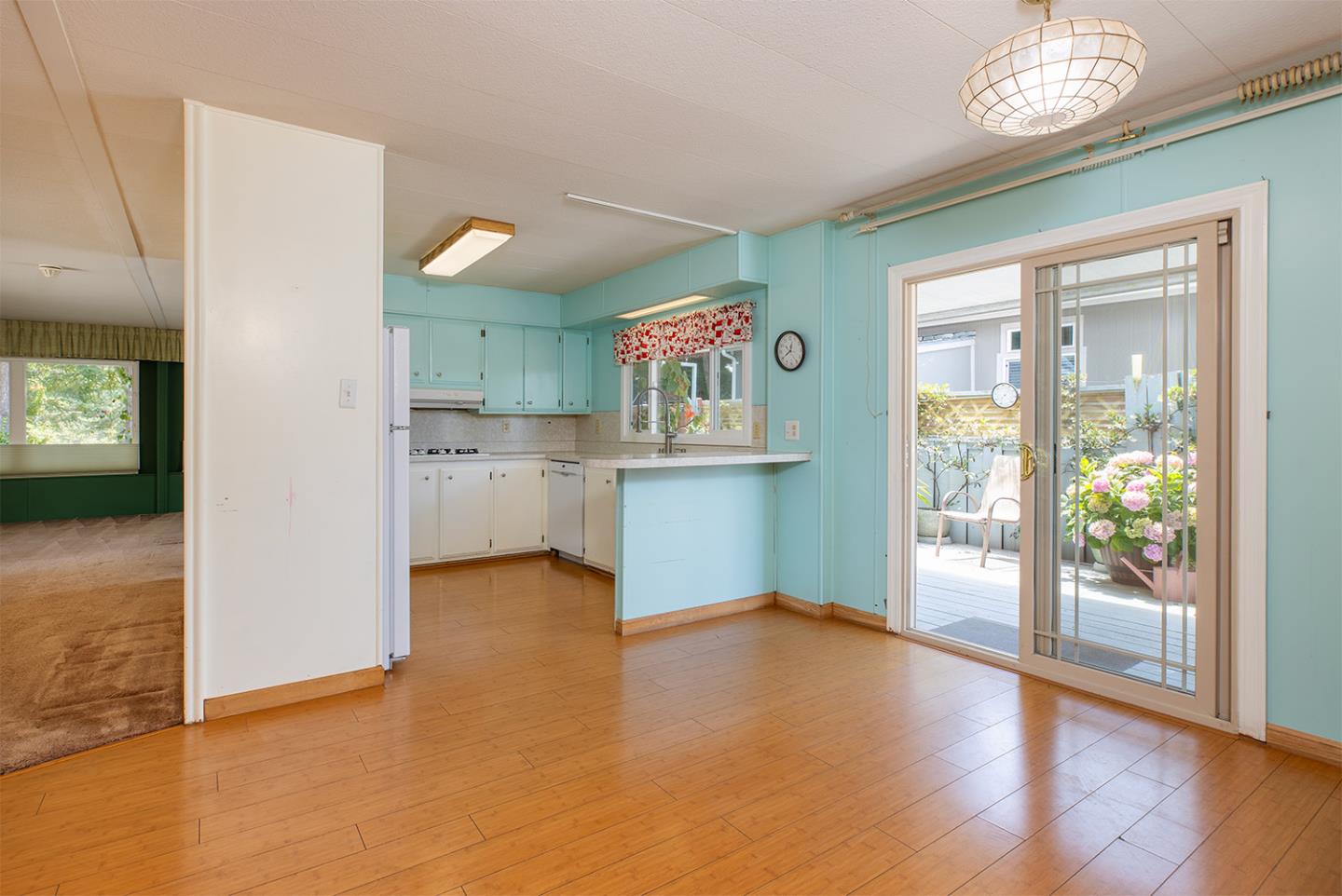 7 Oak Shadows Lane Aptos, CA 95003 - Photo 14 of 36 a view of a kitchen with wooden floor and a window