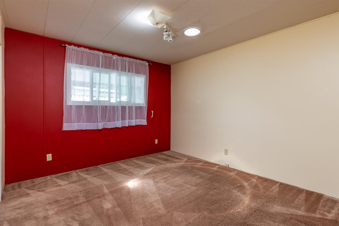7 Oak Shadows Lane Aptos, CA 95003 - Photo 19 of 36 a view of an empty room with a window