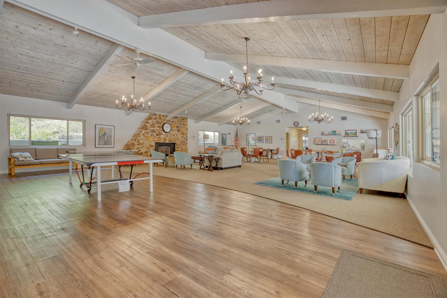 7 Oak Shadows Lane Aptos, CA 95003 - Photo 30 of 36 a living room with lots of furniture and a chandelier