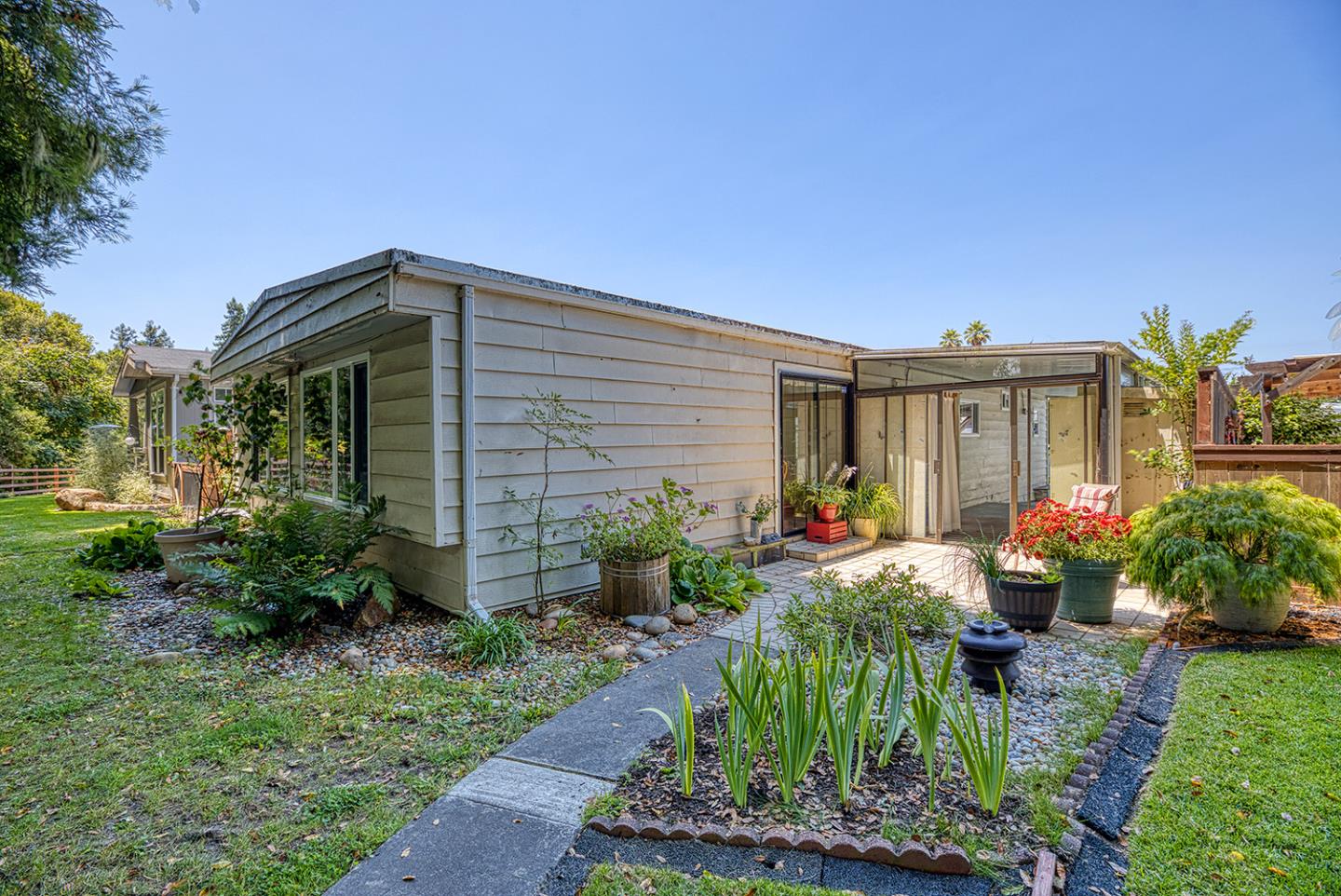 7 Oak Shadows Lane Aptos, CA 95003 - Photo 35 of 36 a front view of a house with garden