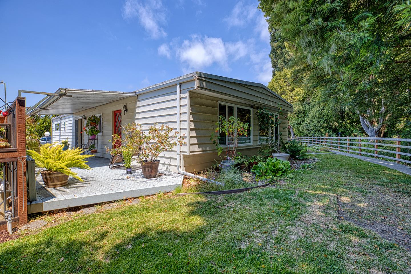 7 Oak Shadows Lane Aptos, CA 95003 - Photo 6 of 36 a view of house with backyard and outdoor seating