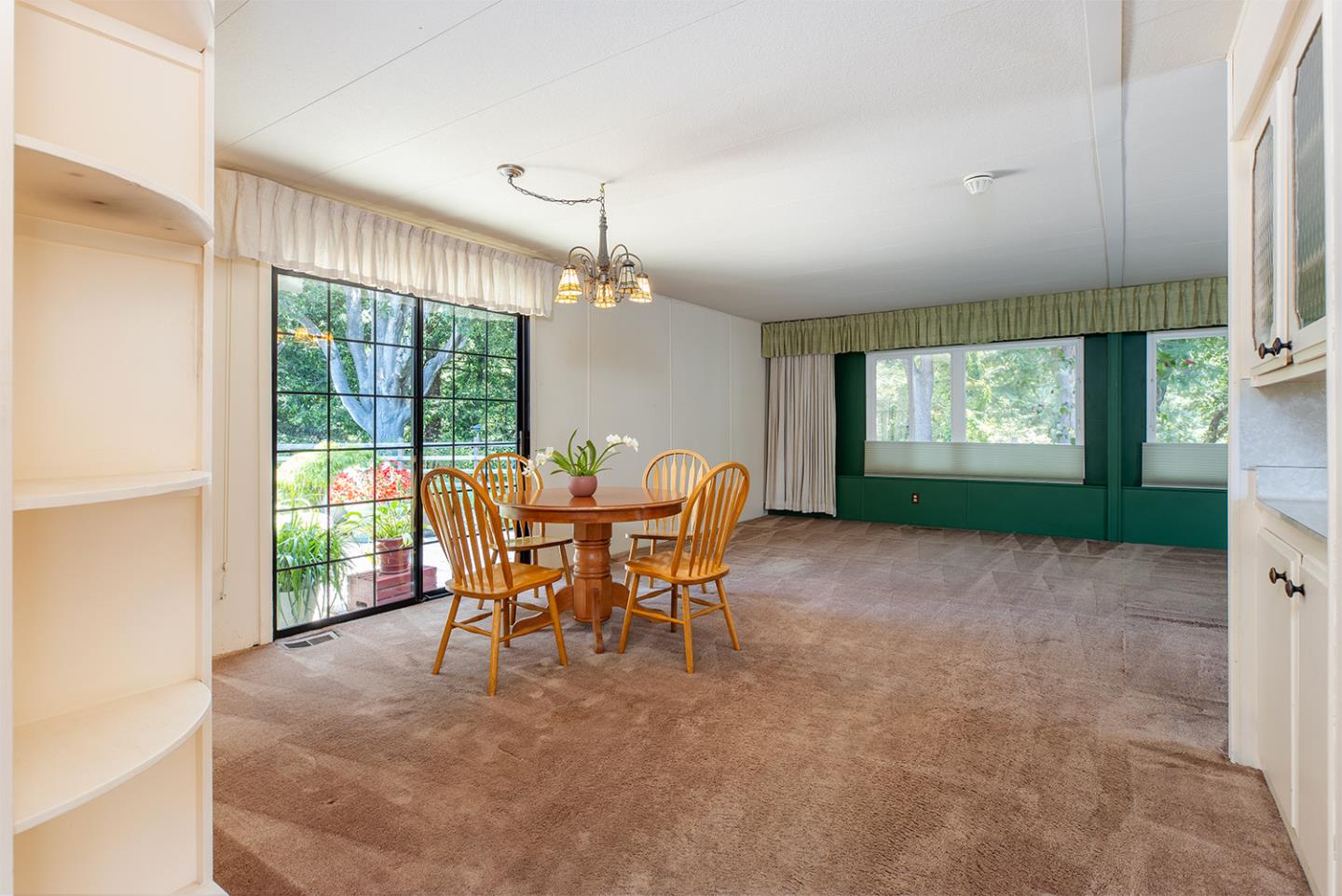 7 Oak Shadows Lane Aptos, CA 95003 - Photo 10 of 36 a dining room with furniture and a floor to ceiling window